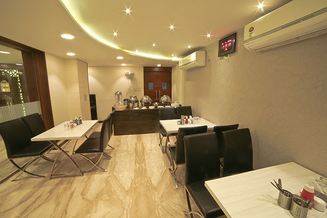hotels near Bus station Surat